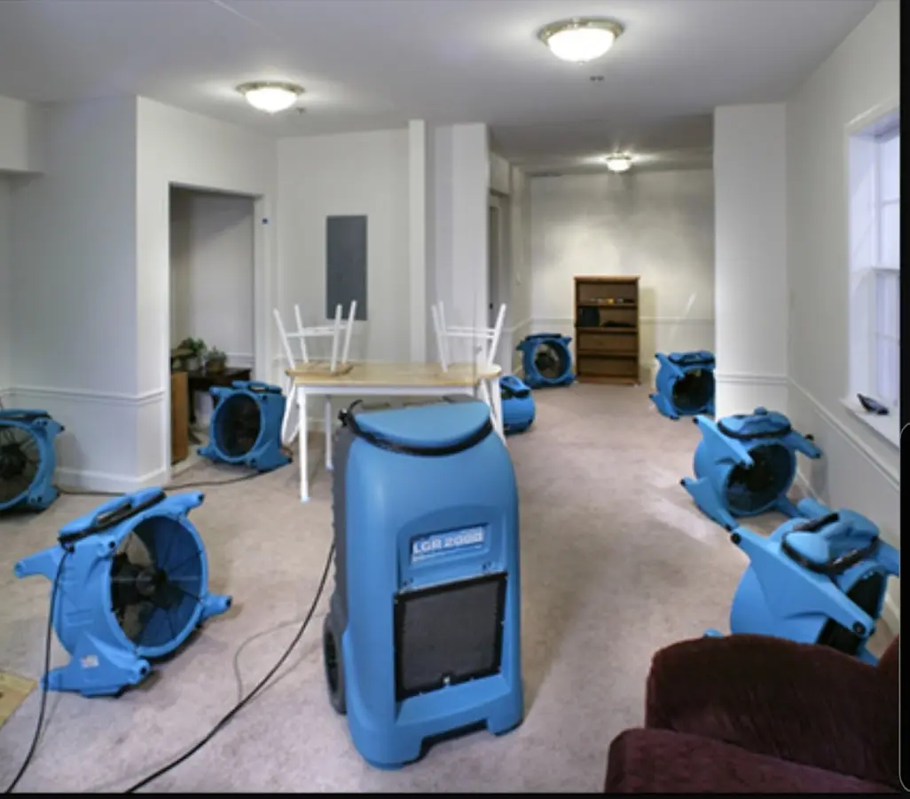 Air movers and dehumidifier setup for Water Extraction & Removal in Henrietta
